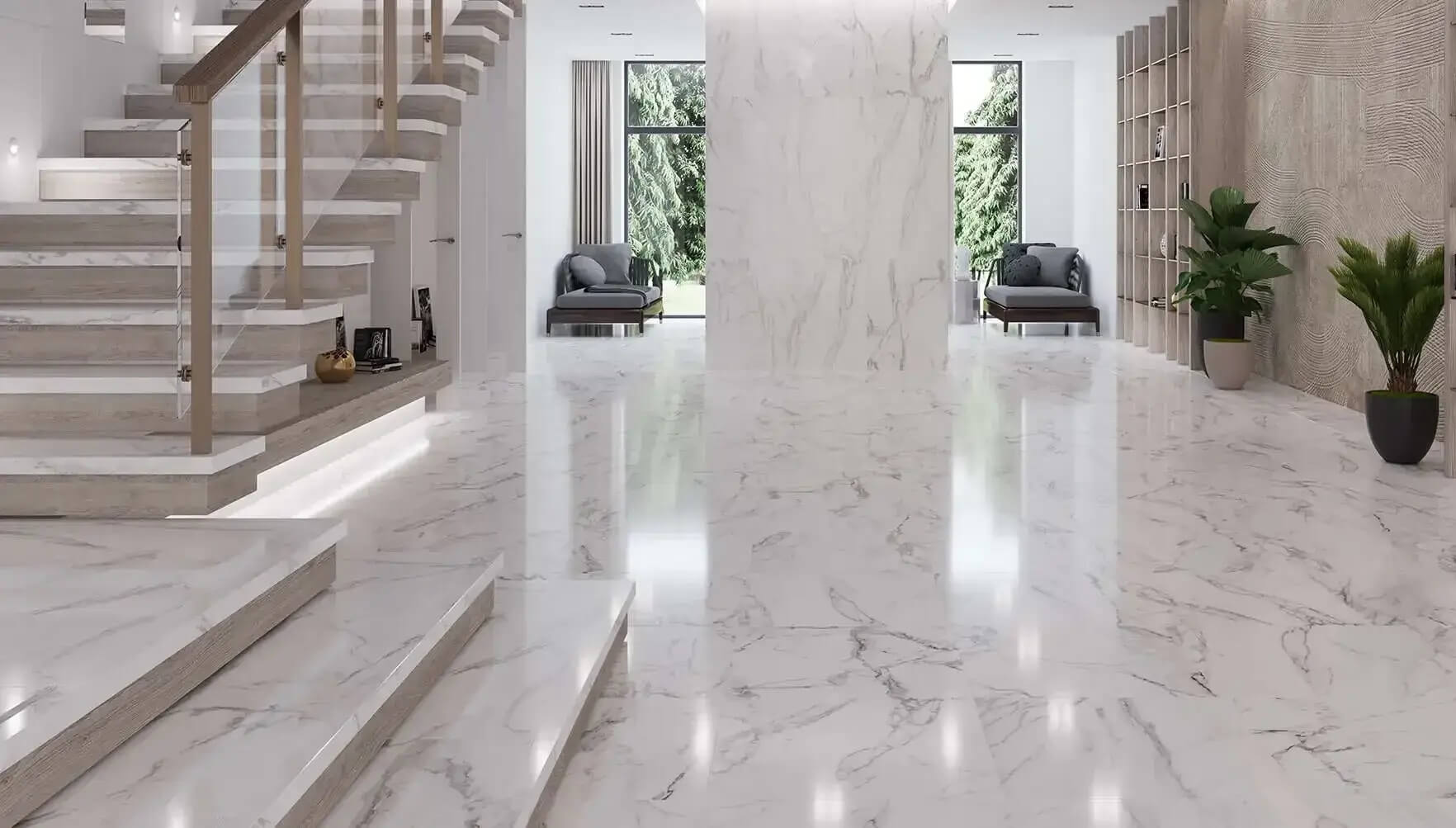 Luxury modern interior with polished marble tile flooring, open staircase, and floor-to-ceiling stone columns